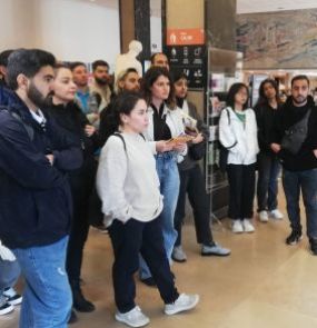 Students on a visit with a tour guide